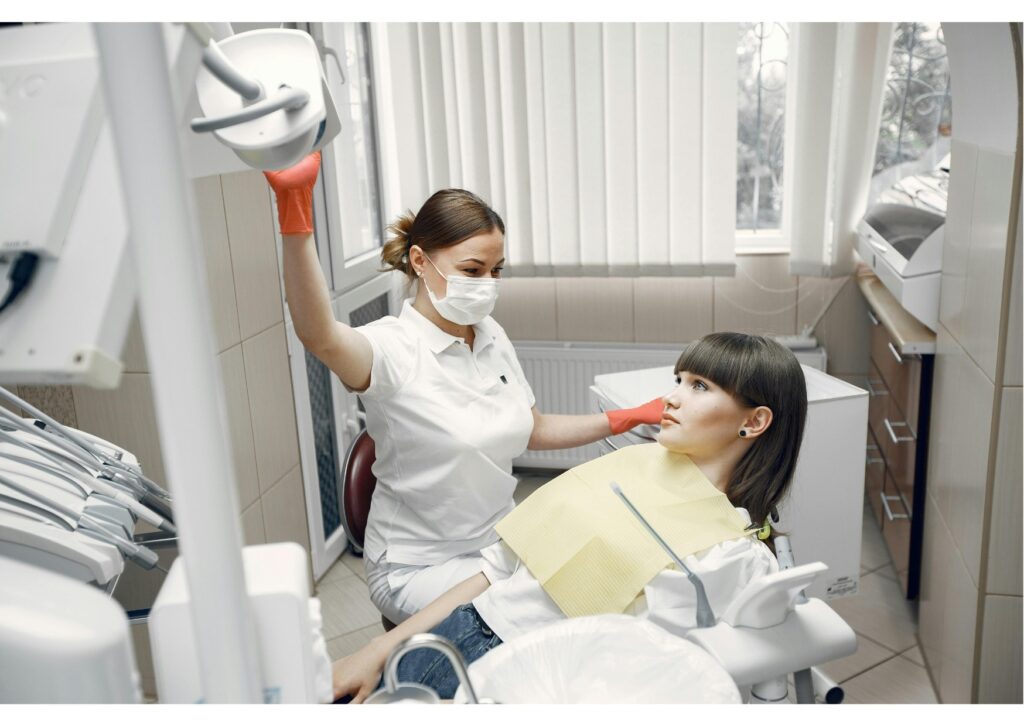 Patient discussing treatment planning and dental implant costs during a consultation appointment