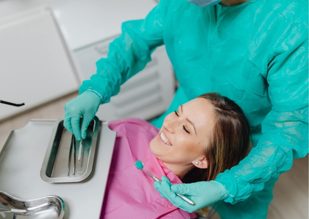 Patient discussing treatment options with a dentist for fixing worn or grinded teeth, including restorative procedures to repair enamel damage caused by teeth grinding.